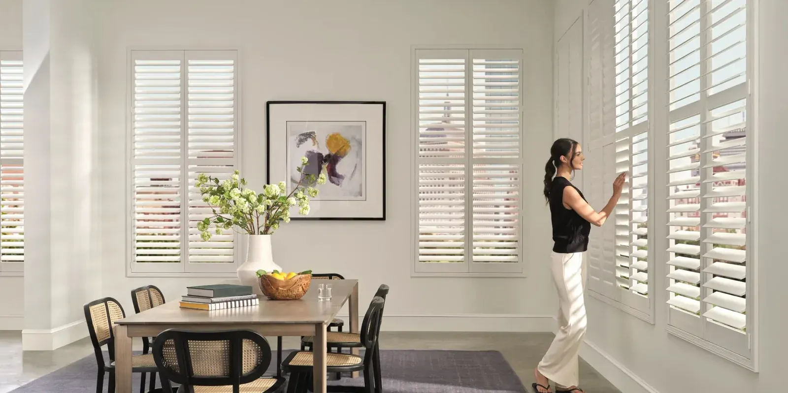 Palm Beach polysatin shutters in a dining room