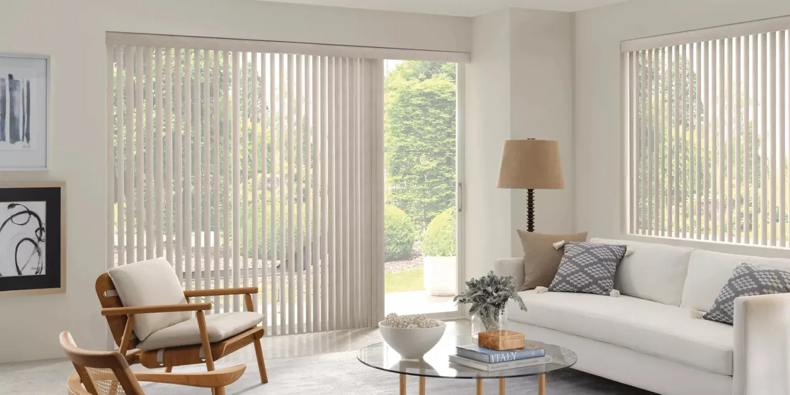 Custom vertical blinds on a patio door in a bright living room